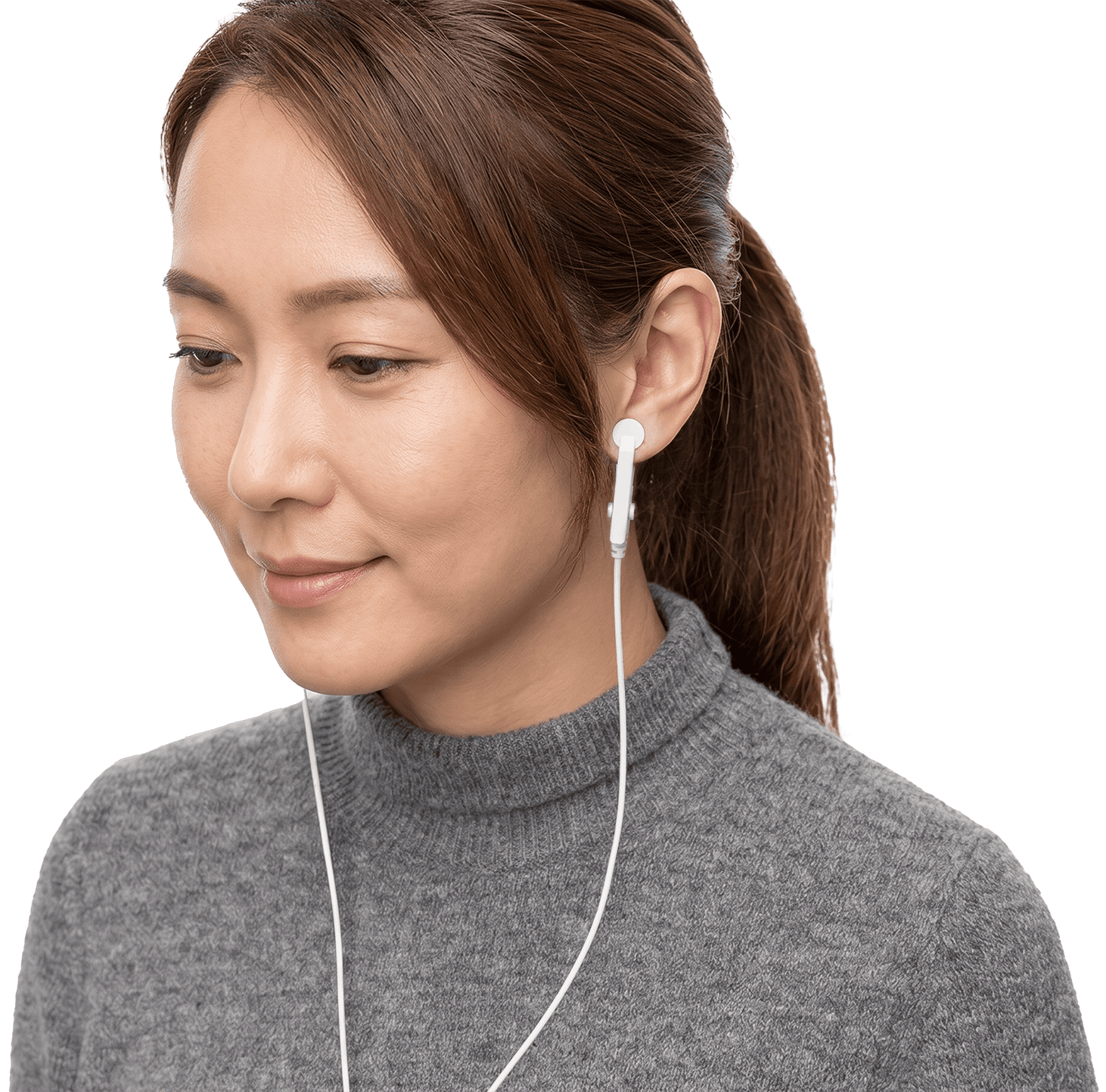 A woman wearing the SOTA Bio Tuner Ear Clips on her ear lobes